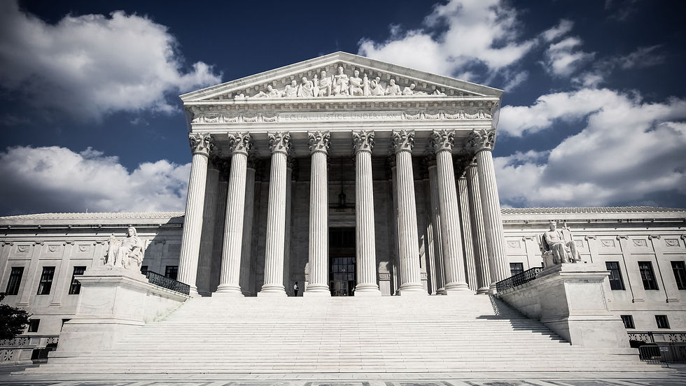 LARGE PILLARED COURTHOUSE IMAGE WITH MARBLE STATUES FLANKING STEPS LEADING UP AND INTO THE BUILDING ROMAN INFLUENCE