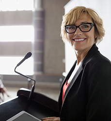 Woman on Podium