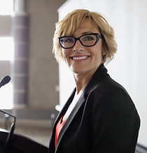 Woman on Podium