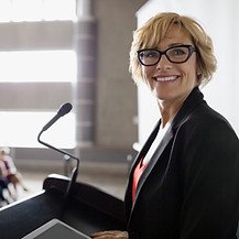 Woman on Podium