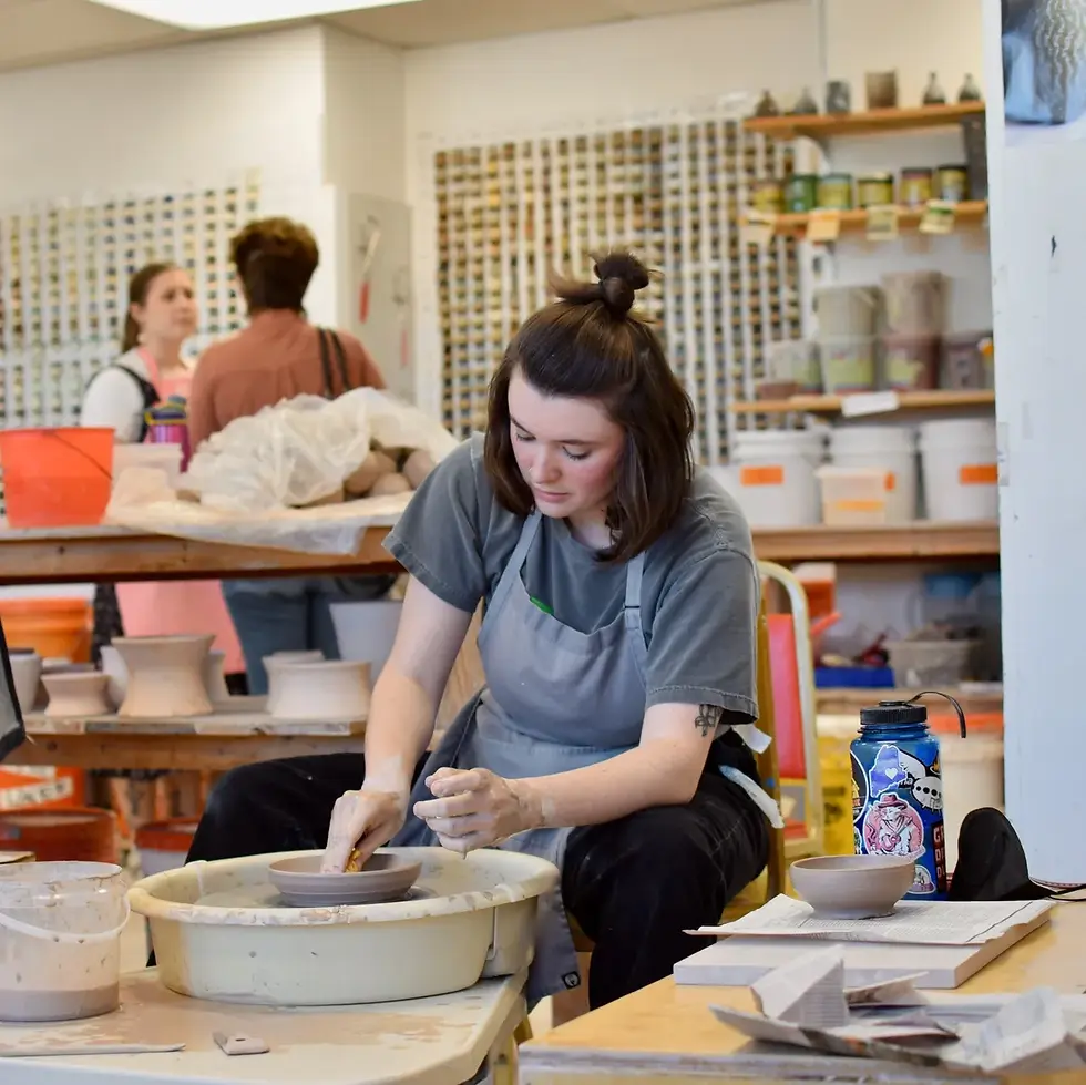 Community Kiln Women at wheel.webp
