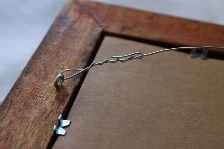 Hanging-wire-on-back-of-frame-how-to-hang-an-old-frame-remodelista.jpg