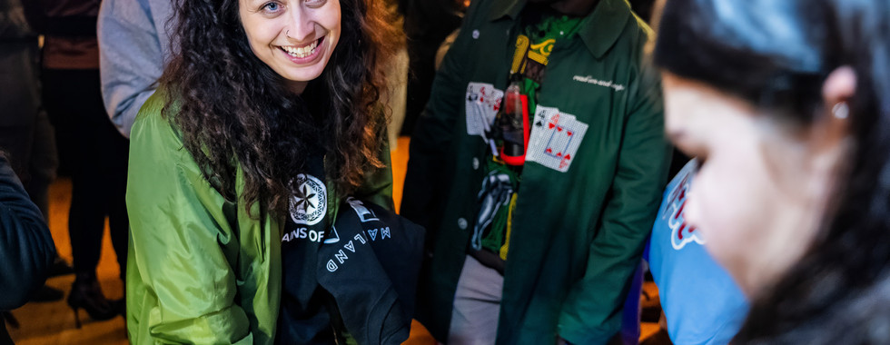 Professional cannabis lifestyle photography by Maryland Connoisseur Studio, featuring candid event moments and detailed product preparation scenes, 2025 Maryland Leaf Holiday Party