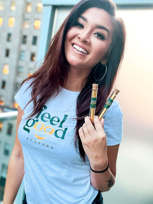 High vibes, bright smiles – repping Feel Good Flavors with golden style and elevated energy.