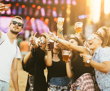 Friends drinking beer and having fun at