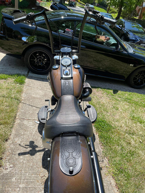 Custom Leather Tank bib and rear fender bib on bike.jpeg