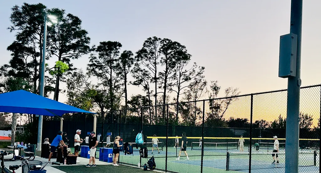 People playing outdoor pickleball in Sarasota, Florida.