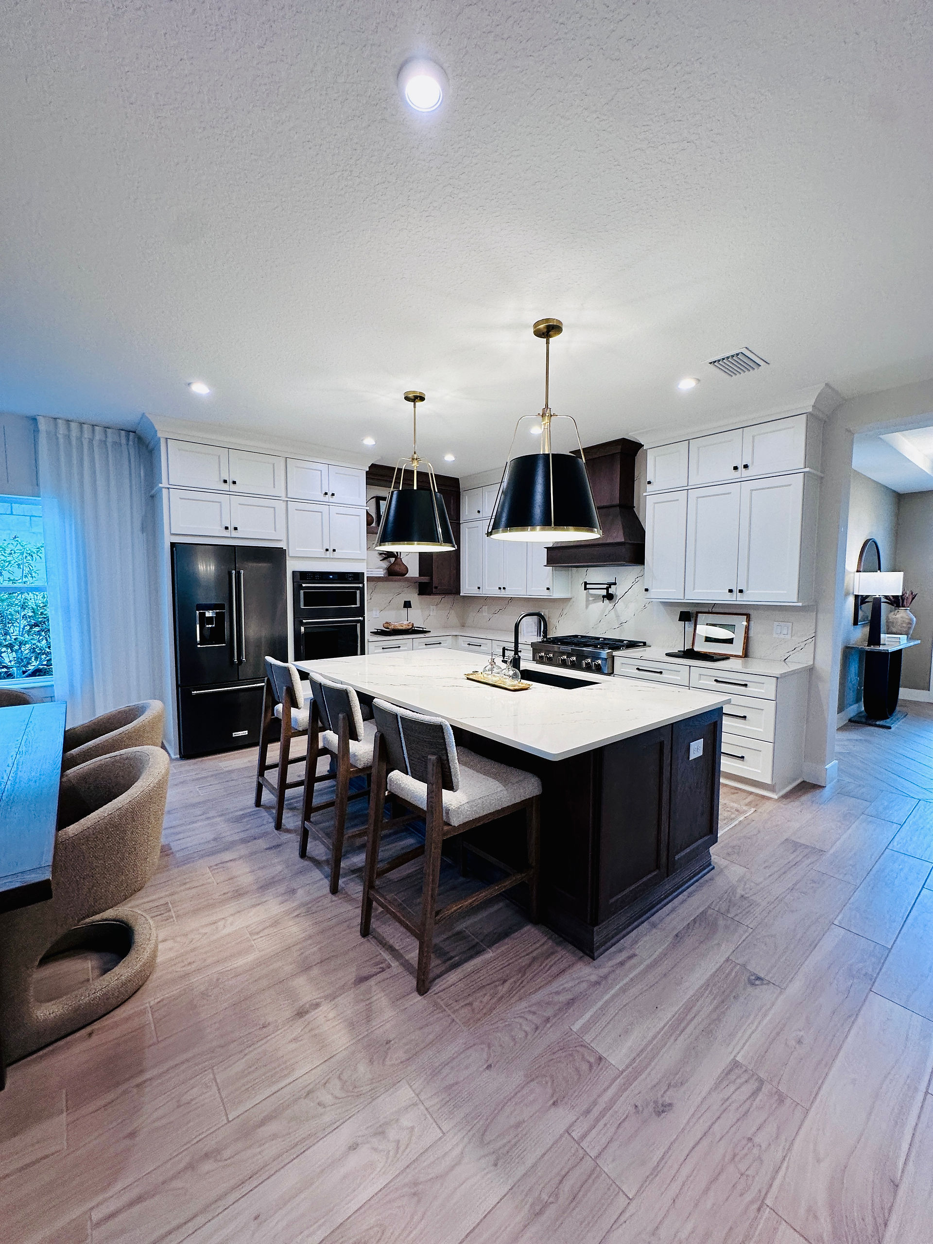 A coastal modern living, kitchen and great room.