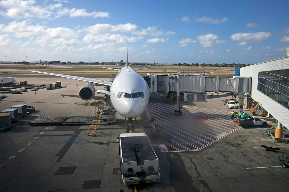 Large passenger airplane at gate