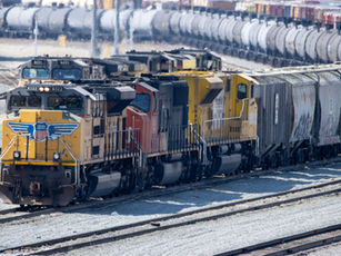 Freight trains loaded with industrial goods powering regional economies.