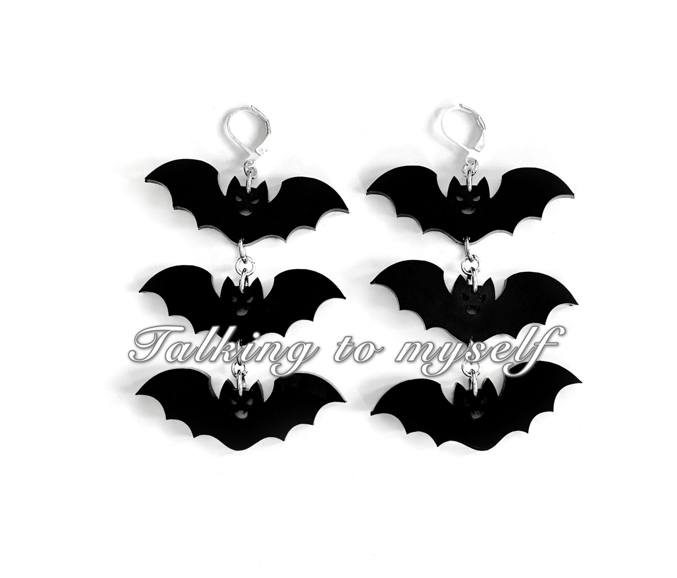 Triple Black Bat - korvakorut