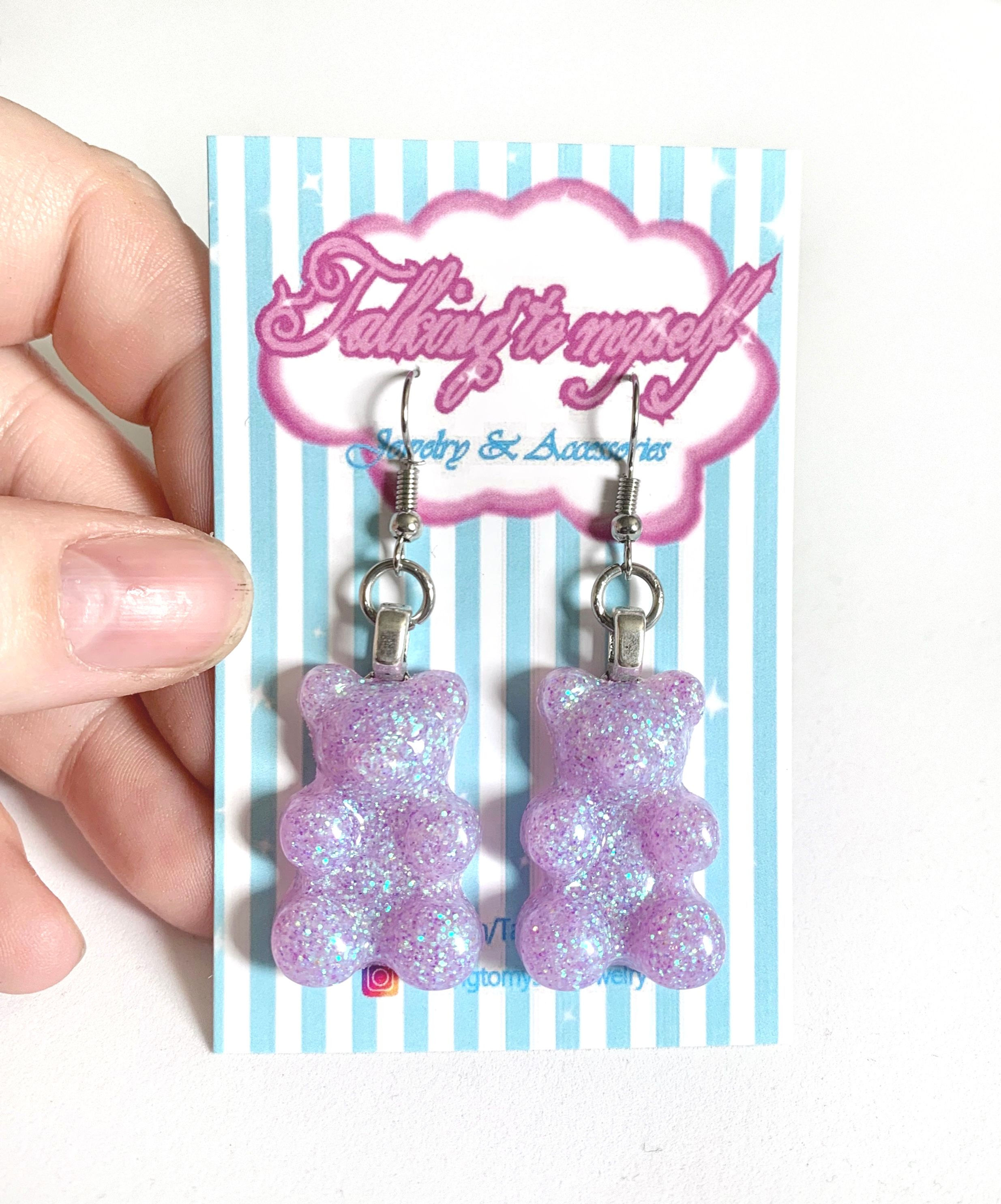 Nallekarkki-korvakorut - lila glitter