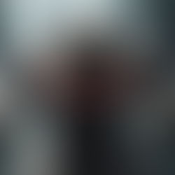 Ferocious beast with horns and sharp teeth against a cityscape background. "Chemonics Aid Scandal" text in red across its chest.