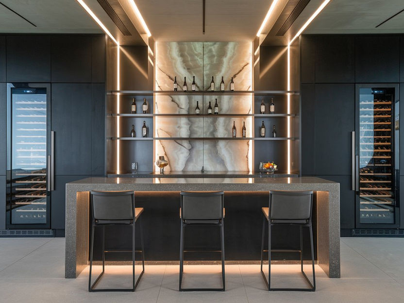 Here are the title, description, and alt text for each image in your screenshot:
Image 1 (Wine Bar)
Title: Contemporary Wine Bar
Description: This sophisticated home wine bar features sleek matte cabinetry and a dramatic backlit onyx feature wall. Integrated LED lighting highlights a curated wine collection displayed on floating shelves, while the minimalist island offers perfect seating for tasting and conversation.
Alt text: M