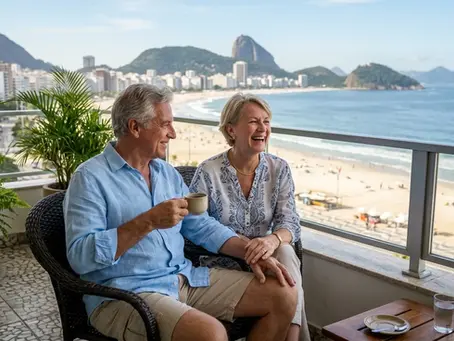 Retired couple enjoying ocean views illustrating the Brazil retirement visa lifestyle for senior expats.