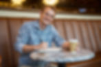 Bailey Knuth, owner of Trust Design Agency, listens to a client on what they need to grow their brand