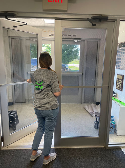 entrance to elementary school showing window graphics designed by The Print Shop 4 U in Imlay City