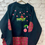 Thumbnail: NFE Ugly Sweater – “Everybody” Holiday Edition (Preorder – Ends December 10th)