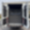 Van cargo area with black dividers and storage pockets