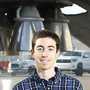 Mark SpaceX Flag Picture Headshot.jpg