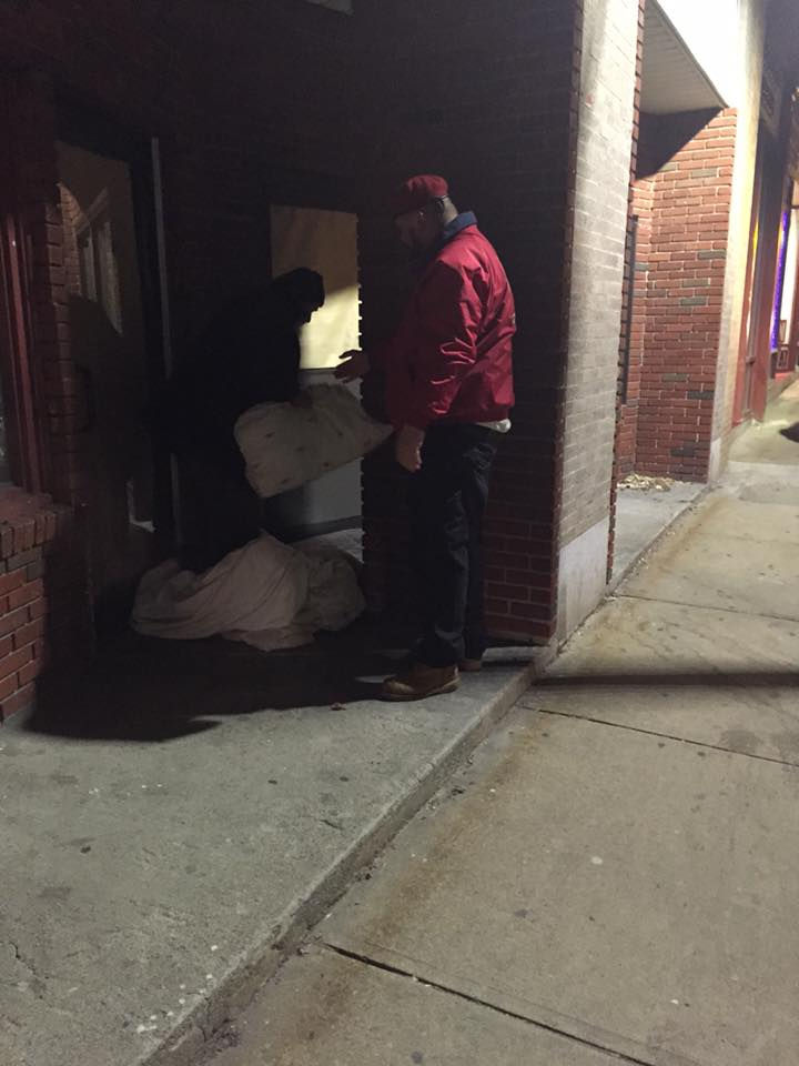 Arch angels handing out a pillow