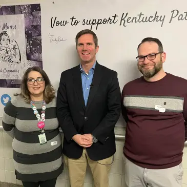 Matt and Lauren Bratcher with Kentucky Governor Andy Beshear at the Capitol in Frankfort 