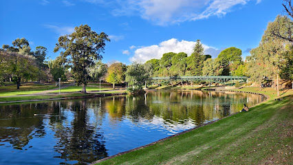 Photo of a lake and trees in park by Adelaide, Australia.