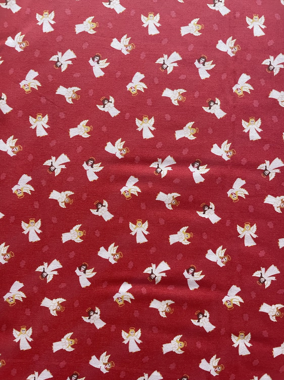 Red fabric with angels