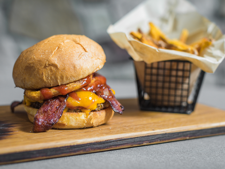 Gourmet burger and sweet potato fries served at Bourbon, Brews & Burgers in Parker, Colorado