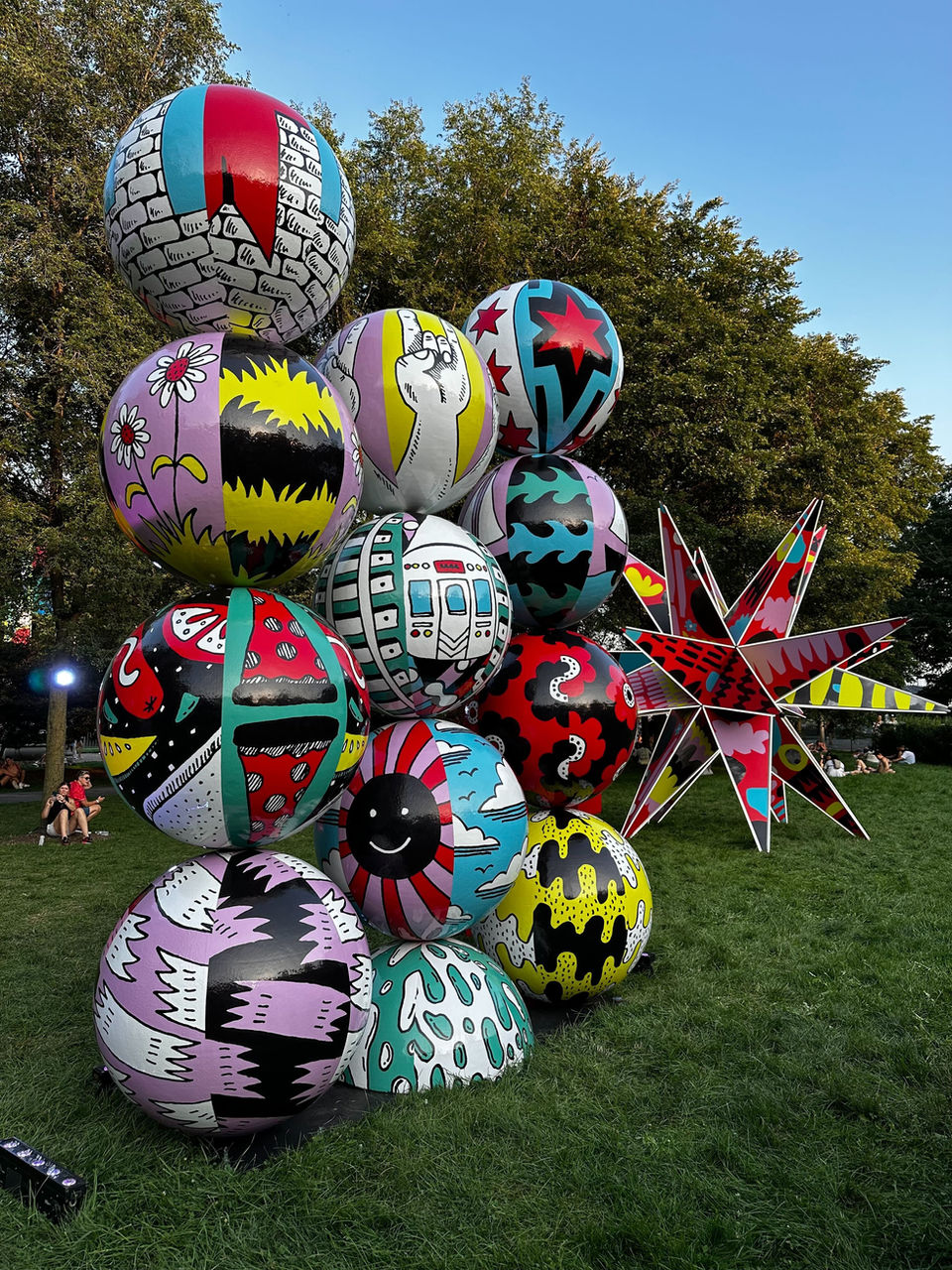 Giant Balls with painted graphics for Adobe’s Art Garden sculpture garden at Lollapalooza featuring 3D artworks by Chicago artists created with Adobe’s design tools.
