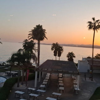 The sun going down in Benalmadena, by Paul W