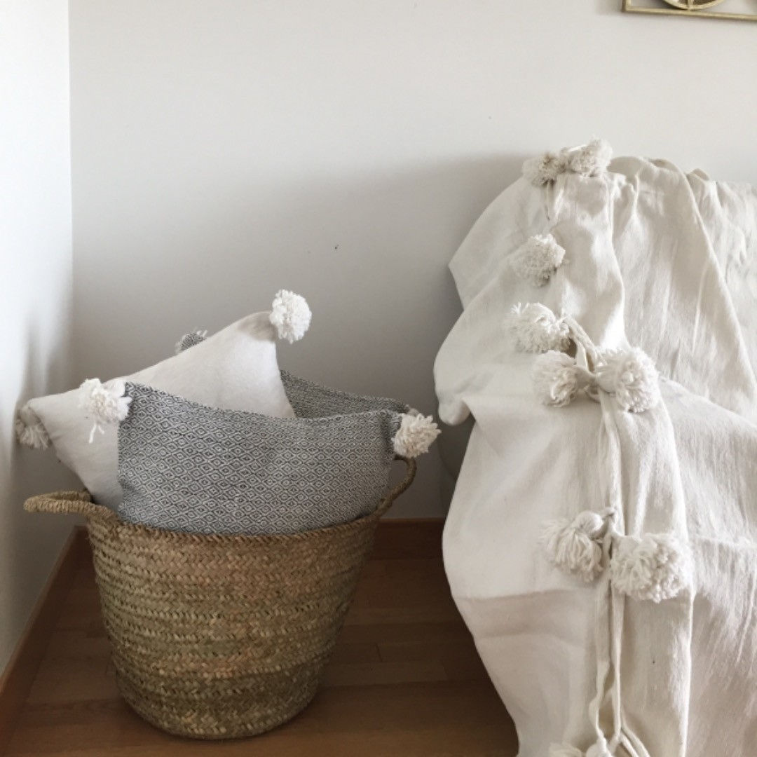 Plaid à pompons uni