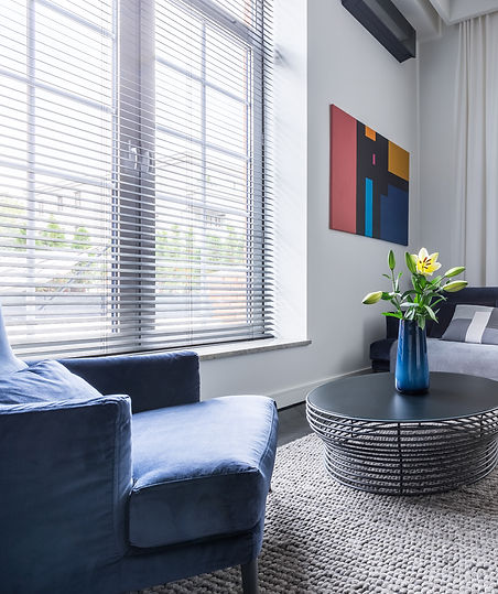 Modern room with bright window blinds