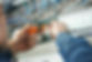 The hands of the electrician using a screwdriver to repair the electricity