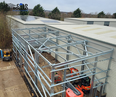 Durable cold-formed steel building skeleton showing lattice roof design and structural columns