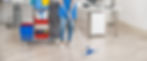 a woman cleaning floor using a mop
