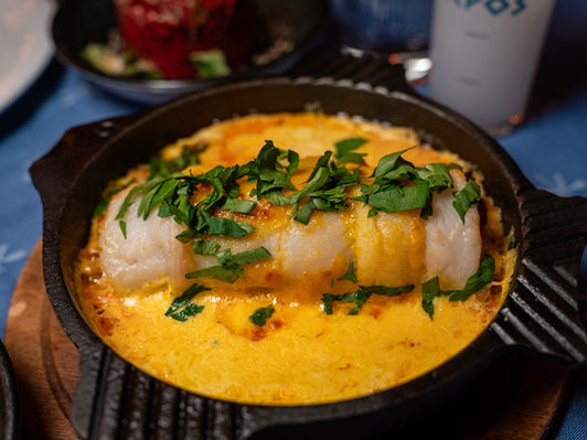 Best hot appetizers in Ankara; Dil Sarma in a clay pot, buttered shrimp casserole, and fried calamari at Kepos Balık Evi.