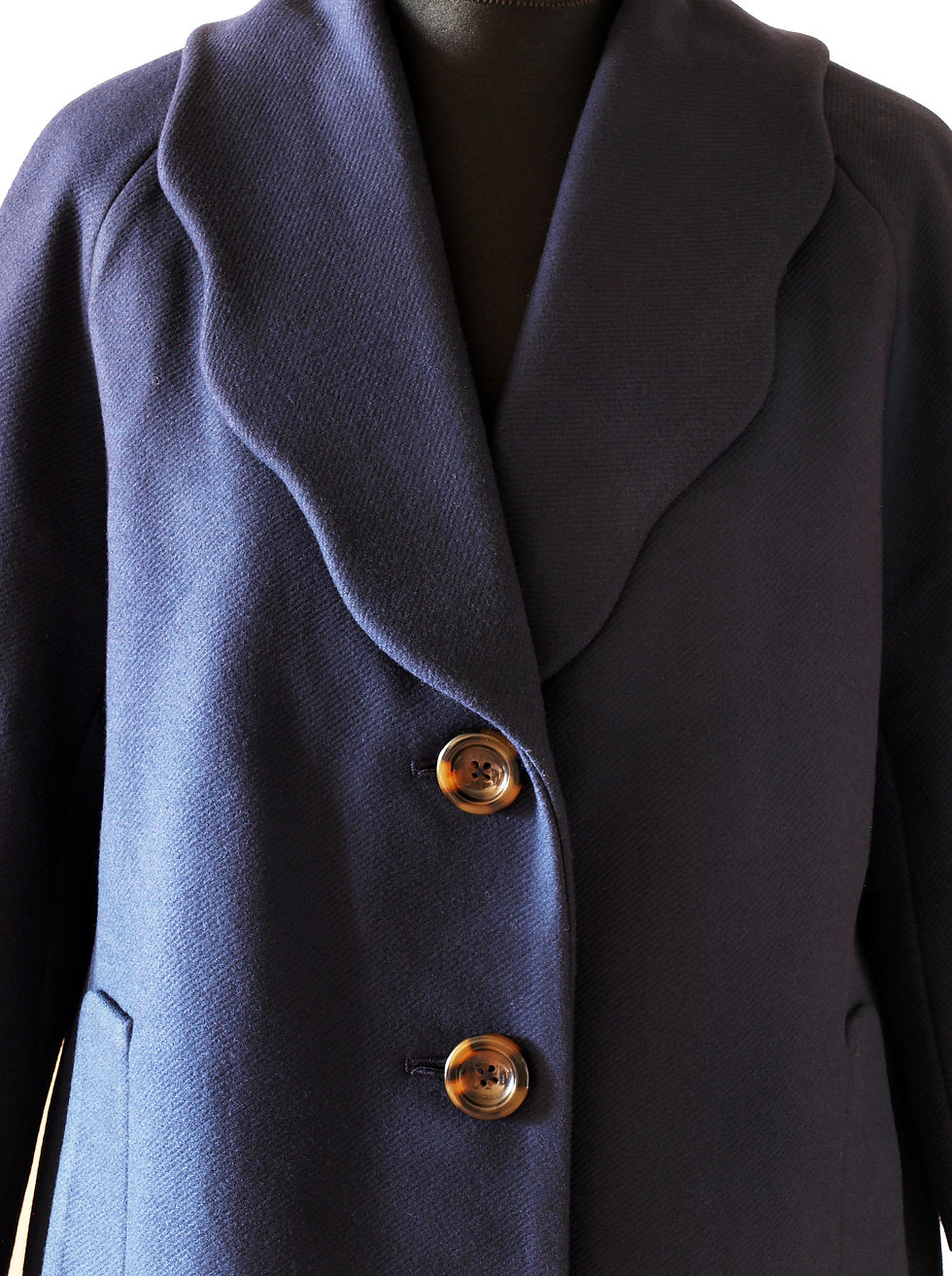 Thumbnail: handmade tailored woollen overcoat with a wavy-shaped lapel