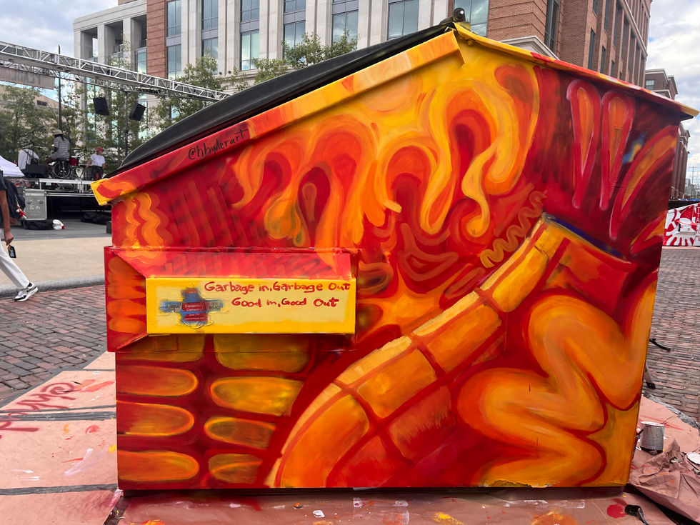 Trash To Treasure mural with the University District- side one