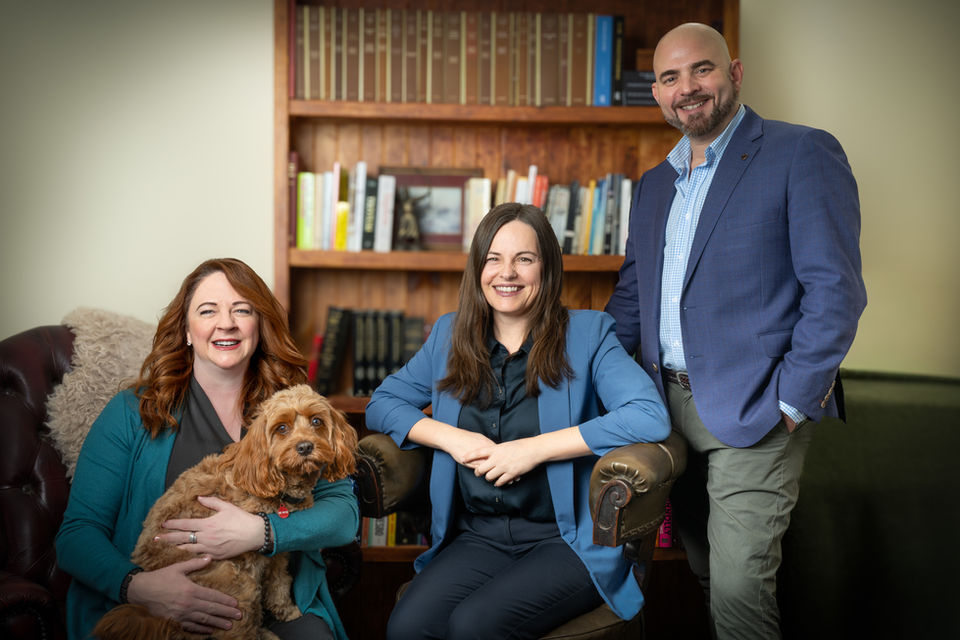 Picture of Ben, Hollie, and Amber in an office of Bruce Psychology in Mandurah, happy and professional.
