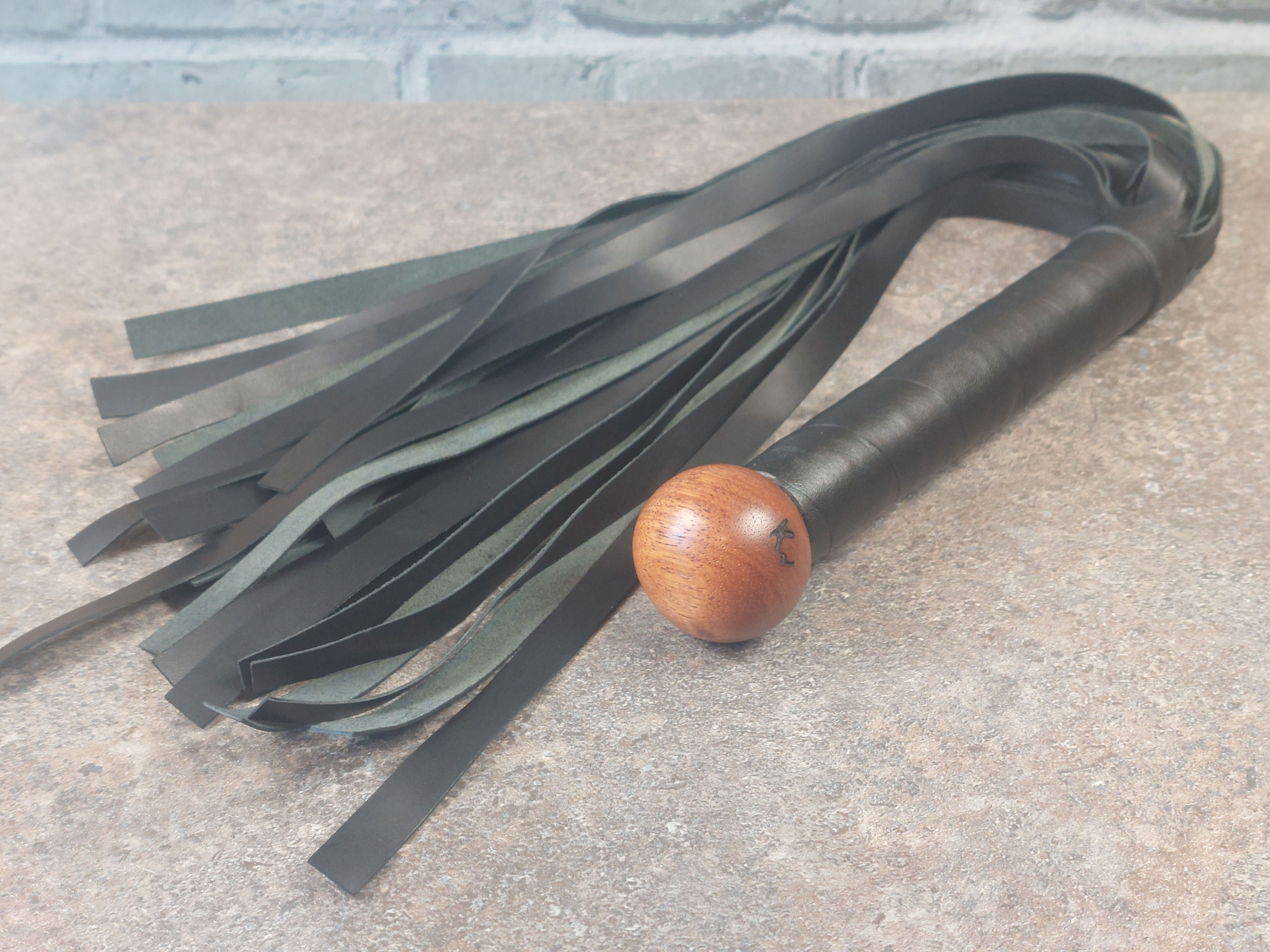 Leather Flogger with Sipo Finial