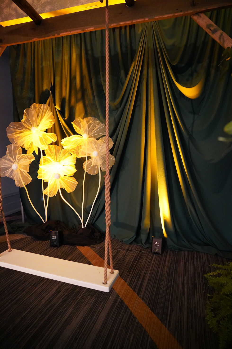 Close-up view of layered draping with navy and gold fabrics at an Indianapolis event venue