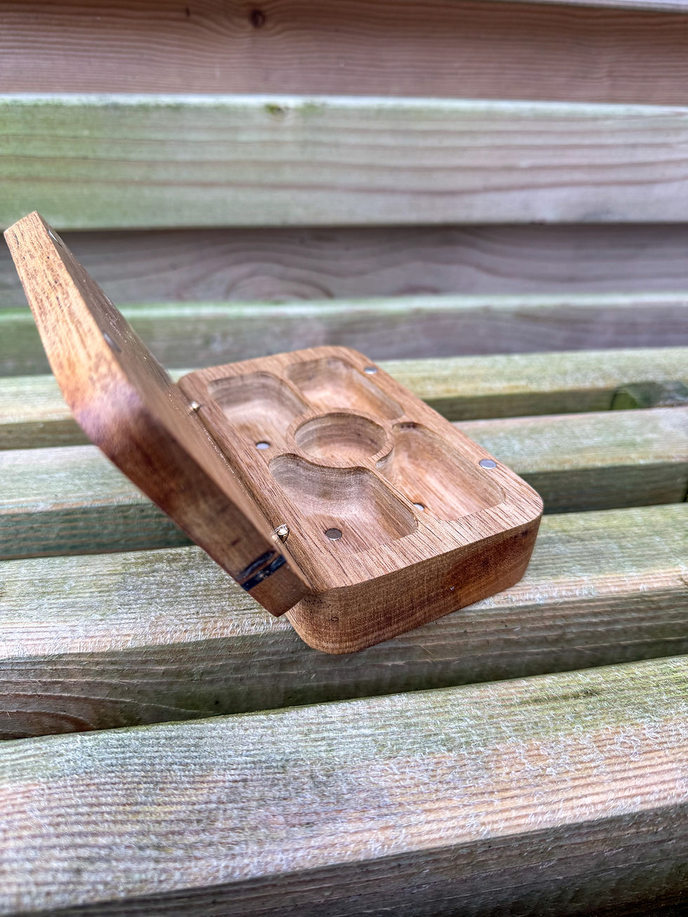 Thumbnail: beautiful oak walnut zebrano hardwood handmade fly fishing box case with a wooden back ground on a wooden bench uk made