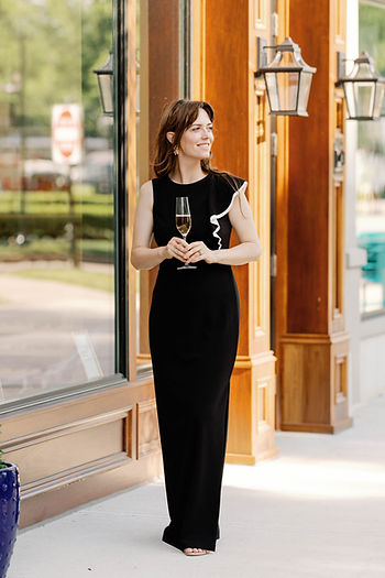 Andrea Simpson, co-owner of an alcohol-free beverage store in front of the store in Carmel, IN.