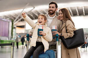 medium-shot-happy-family-airport (1).jpg