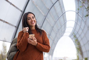 cheerful-attractive-young-woman-with-black-hair-walking_edited_edited.jpg