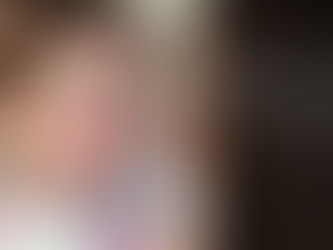 Woman comforting a young child who appears upset, offering close emotional support.