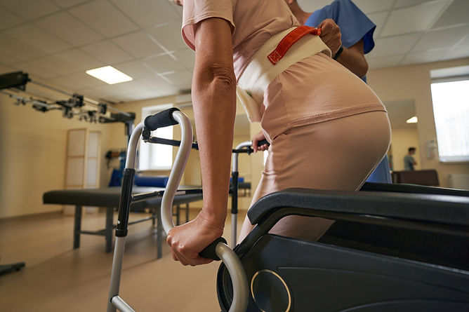 woman-with-physical-disability-using-walking-frame-2021-11-04-21-23-00-utc.jpg