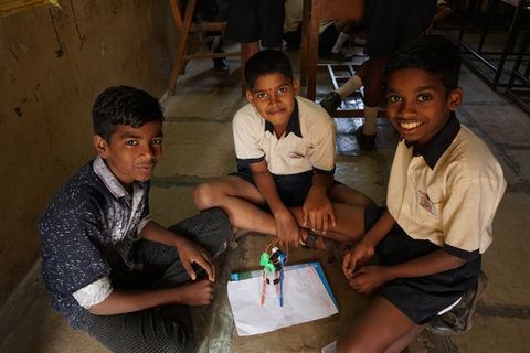 TAP students with a science project.