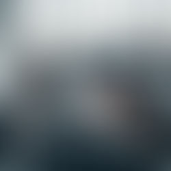 Frustrated office workers sit at their computers